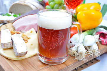 Meal concept with bread, tomatoes, cheese, beer, bacon - 22996038