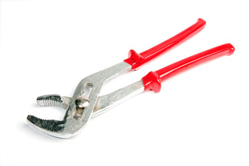 Metal water pump pliers with red handle isolated on white backgr