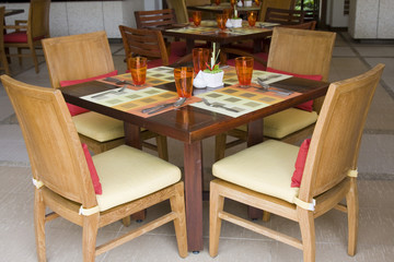 Table and chairs in empty cafe