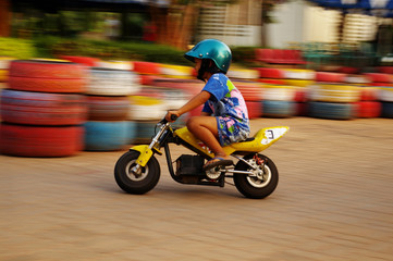 kid riding a motorcycle