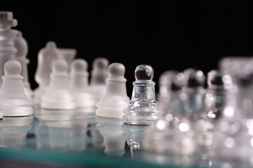 Opaque and clear chess set.