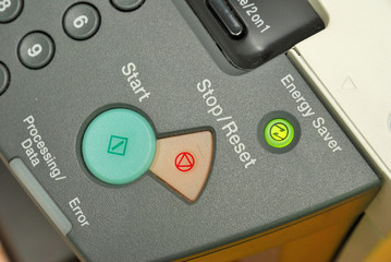 Lighted energy saving button on machine