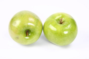 Two green apples on white background
