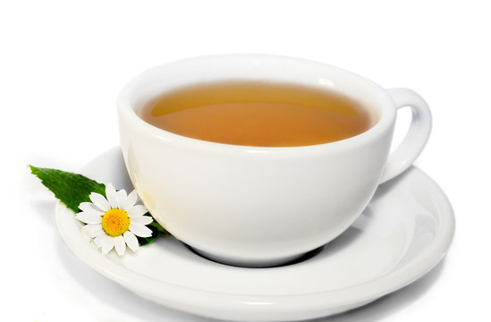 Herbal camomile tea isolated on white background