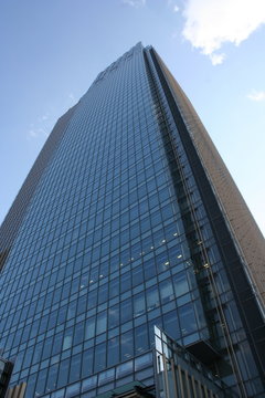 Tokyo skyscraper, blue sky and a cloud