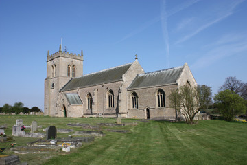 A Traditional English Country Church with a Tower.