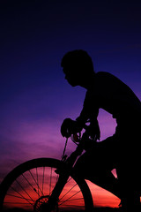 young asian man with bike