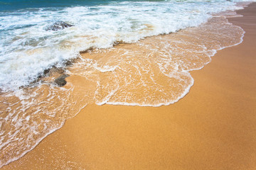 Diagonal of sand and wave background