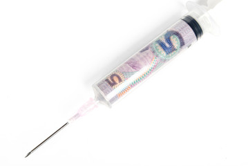 a syringe of money