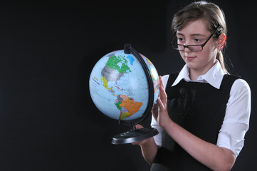 Schoolgirl and globe