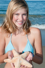 Beautiful young girl at tha beach