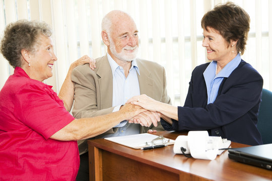 Senior Business Group Handshake