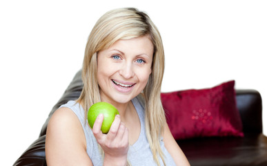 Radiant woman eating an apple