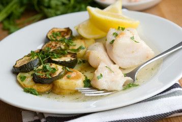 Pan-fried cod with creamy new potatoes and courgettes