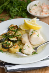 Pan-fried cod with creamy new potatoes and courgettes