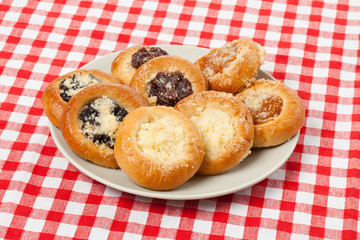 cake on the checkered tablecloth