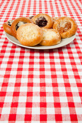 cake on the checkered tablecloth