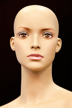 Face of a bald mannequin