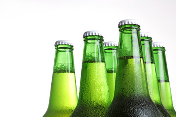 Beer in bottle on a white background .