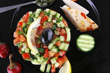 small roast meat chunks on black