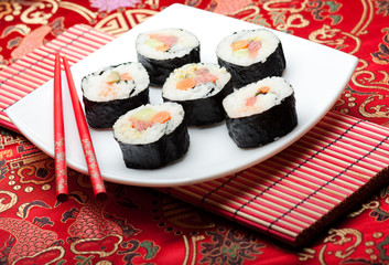 Sushi rolls on japanese silk