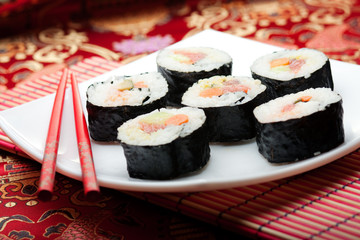 Sushi rolls on japanese silk
