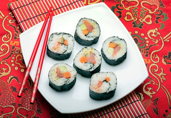 Sushi rolls on japanese silk