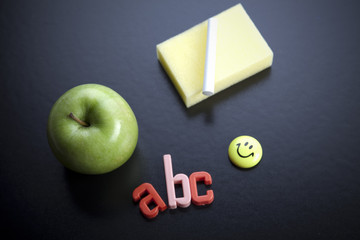 Blackboard and apple