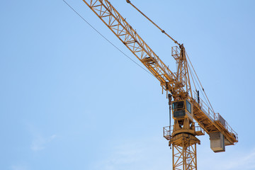 construction crane closeup with sky as a background