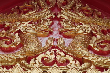 buddhist art on gable of temple, Borabue, Mahasarakam