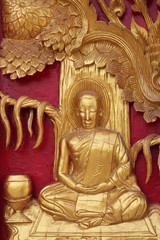 Fototapeta na wymiar buddhist art on door of temple, Na Kha, Wapipatum, Mahasarakam