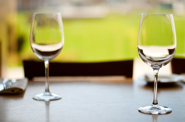 empty goblets on table