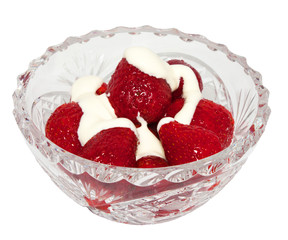 Strawberries with cream in a crystal vase