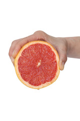 hand squeezing an orange