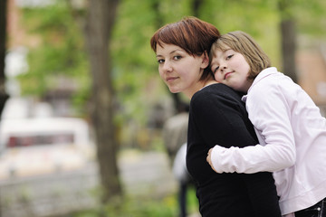 Fototapeta premium happy girl and mom outdoor