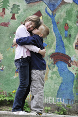 happy brother and sister outdoor in park