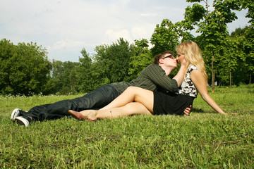 young man and girl kissing outdoor