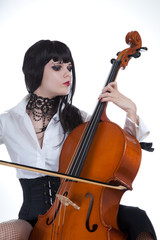 Attractive girl playing cello © Elisanth