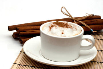 cappuchino and cinnamon sticks