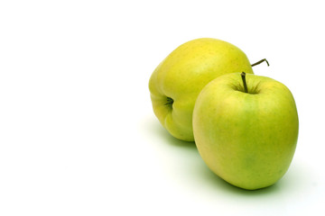 two green apples on white