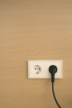 Wall outlet with power cord