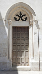 Fototapeta na wymiar Clocktower portal. Altamura. Apulia.