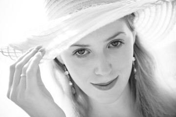 Young woman in hat portrait