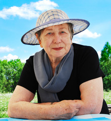 Fototapeta premium Happy senior woman outdoors in summer