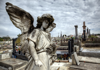 Fototapeta na wymiar Statue of an angel at a Melbourne Cemetery