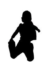 Silhouette of boy jumping up in the air