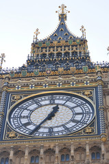Big Ben ornate tower and clock face in London Uk