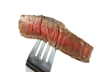 Piece of beef steak on fork © uckyo