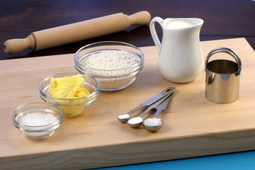 Obraz na płótnie Canvas dough ingredients and kitchen utensils