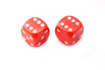 two red game dice isolated on white